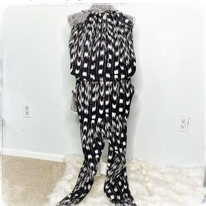 Parker jumpsuit that is perfect for date night or under a blazer.